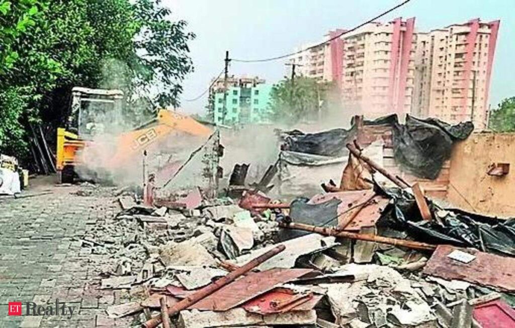 bhubaneswar development body razes chandrasekharpur slum frees two acre government land