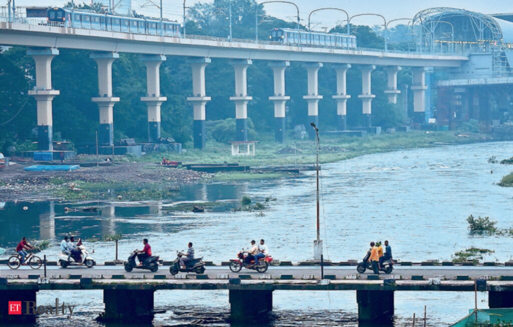 maharashtra education minister seeks action against housing societies polluting river