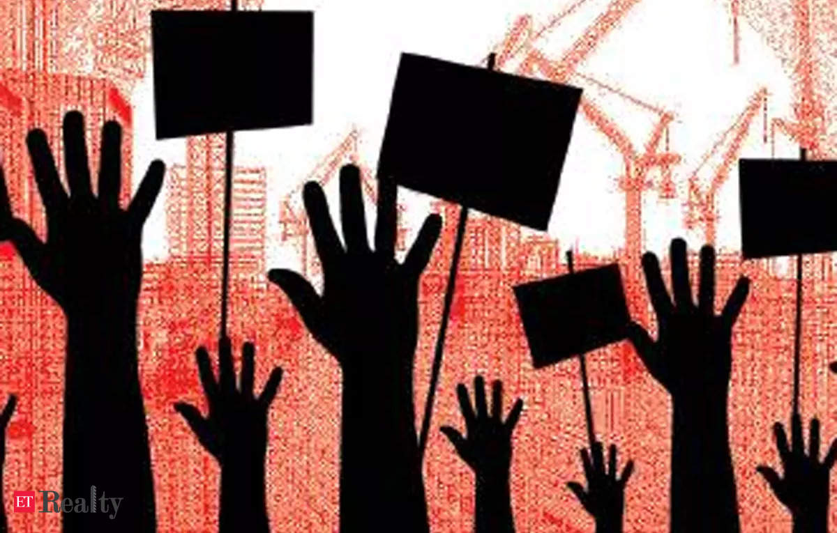 Over 1,400 SDS NRI Township buyers protest against builder's additional compensation demand, ET RealEstate